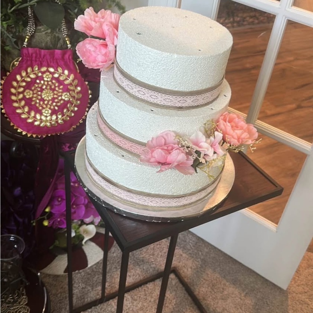 Elegant White and Pink Faux Cake with Floral Accents